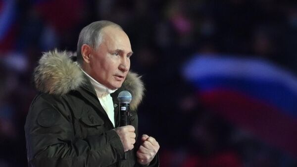 Президент РФ Владимир Путин на концерте в Лужниках в честь воссоединения Крыма и России
