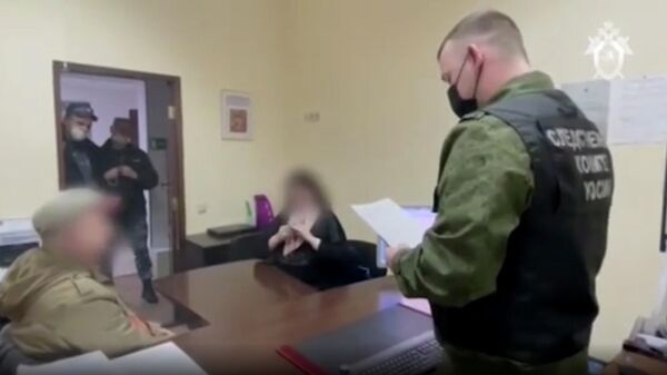 Задержанные за вербовку в организацию Свидетели Иеговы* в Сочи. Кадр видео