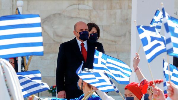 Председатель правительства РФ Михаил Мишустин во время военного парада по случаю Дня независимости Греции на площади Синтагма в Афинах