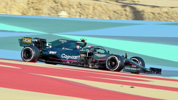 Aston Martin's German driver Sebastian Vettel drives during the third day of the Formula One (F1) pre-season testing at the Bahrain International Circuit in the city of Sakhir on March 14, 2021. (Photo by Mazen MAHDI / AFP)