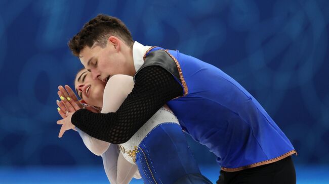 Карина Акопова и Никита Рахманин во время выступления с произвольной программой