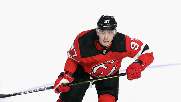 NEWARK, NEW JERSEY - MARCH 14: Nikita Gusev #97 of the New Jersey Devils skates against the New York Islanders at the Prudential Center on March 14, 2021 in Newark, New Jersey.   Bruce Bennett/Getty Images/AFP (Photo by BRUCE BENNETT / GETTY IMAGES NORTH AMERICA / Getty Images via AFP)