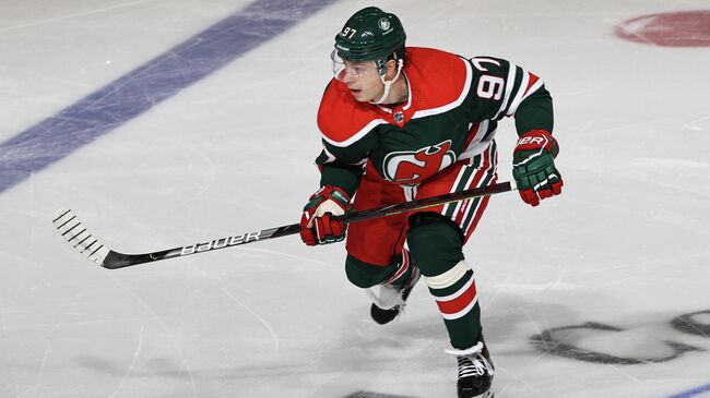 NEWARK, NEW JERSEY - MARCH 06: Nikita Gusev #97 of the New Jersey Devils skates in the first period against the New York Rangers at Prudential Center on March 06, 2021 in Newark, New Jersey.A limited number of fans are in attendance due to COVID-19 restrictions.   Elsa/Getty Images/AFP (Photo by ELSA / GETTY IMAGES NORTH AMERICA / Getty Images via AFP)