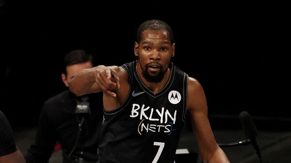 NEW YORK, NEW YORK - FEBRUARY 05: Kevin Durant #7 of the Brooklyn Nets celebrates his three point shot in the second quarter against the Toronto Raptors at Barclays Center on February 05, 2021 in New York City. NOTE TO USER: User expressly acknowledges and agrees that, by downloading and or using this photograph, User is consenting to the terms and conditions of the Getty Images License Agreement.   Elsa/Getty Images/AFP (Photo by ELSA / GETTY IMAGES NORTH AMERICA / Getty Images via AFP)