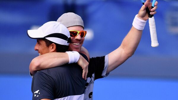 DELRAY BEACH, FLORIDA - JANUARY 13: Ariel Behar of Uruguay and Gonzalo Escobar of Ecuador celebrate after winning against brothers Ryan and Christian Harrison during the Doubles Finals of the Delray Beach Open by Vitacost.com at Delray Beach Tennis Center on January 13, 2021 in Delray Beach, Florida.   Mark Brown/Getty Images/AFP (Photo by Mark Brown / GETTY IMAGES NORTH AMERICA / Getty Images via AFP)