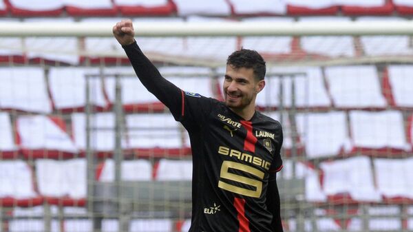 Rennes' French forward Martin Terrier reacts after scoring during the French L1 football match between Stade Rennais (Rennes) and FC Nantes at The Roazhon Park Stadium in Rennes, north-western France on April 11, 2021. (Photo by JEAN-FRANCOIS MONIER / AFP)