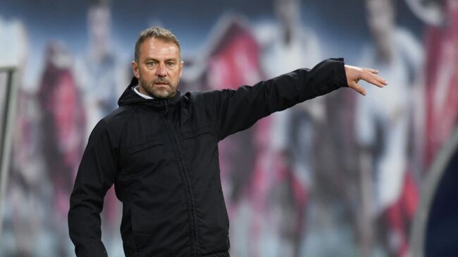 Bayern Munich's German head coach Hans-Dieter Flick reacts from the sidelines during the German first divison Bundesliga football match between RB Leipzig and FC Bayern Munich in Leipzig, eastern Germany, on April 3, 2021. (Photo by ANNEGRET HILSE / POOL / AFP) / DFL REGULATIONS PROHIBIT ANY USE OF PHOTOGRAPHS AS IMAGE SEQUENCES AND/OR QUASI-VIDEO