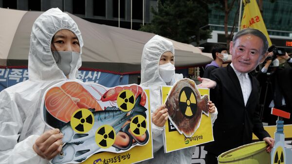Протест против сброса воды с АЭС Фукусима-1 в океан в Сеуле, Южная Корея