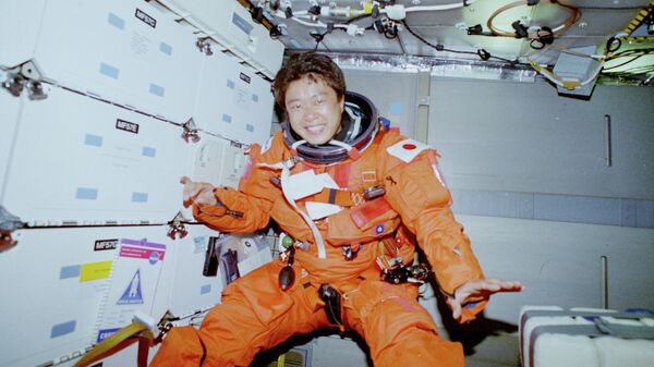 Астронавт японского космического агентства JAXA Тиаки Мукаи 