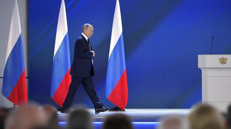 Президент РФ Владимир Путин перед началом выступления с ежегодным посланием Федеральному Собранию