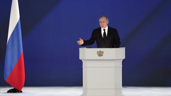 Президент РФ Владимир Путин во время выступления с ежегодным посланием Федеральному Собранию