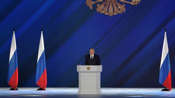 Президент РФ Владимир Путин во время выступления с ежегодным посланием Федеральному Собранию