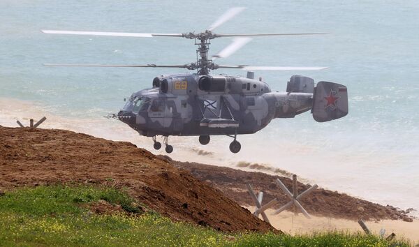 Вертолет Ка-29 во время масштабных учений войск Южного военного округа и ВДВ на полигоне Опук в Крыму Вертолет Ка-29 во время масштабных учений войск Южного военного округа и ВДВ на полигоне Опук в Крыму