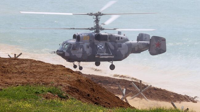 Вертолет Ка-29 во время масштабных учений войск Южного военного округа и ВДВ на полигоне Опук в Крыму