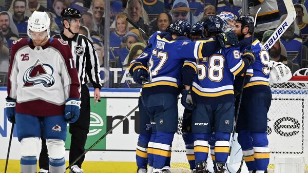Apr 26, 2021; St. Louis, Missouri, USA; St. Louis Blues right wing Vladimir Tarasenko (91) is congratulated by teammates after scoring a goal against the Colorado Avalanche during the first period at Enterprise Center. Mandatory Credit: Jeff Le-USA TODAY Sports