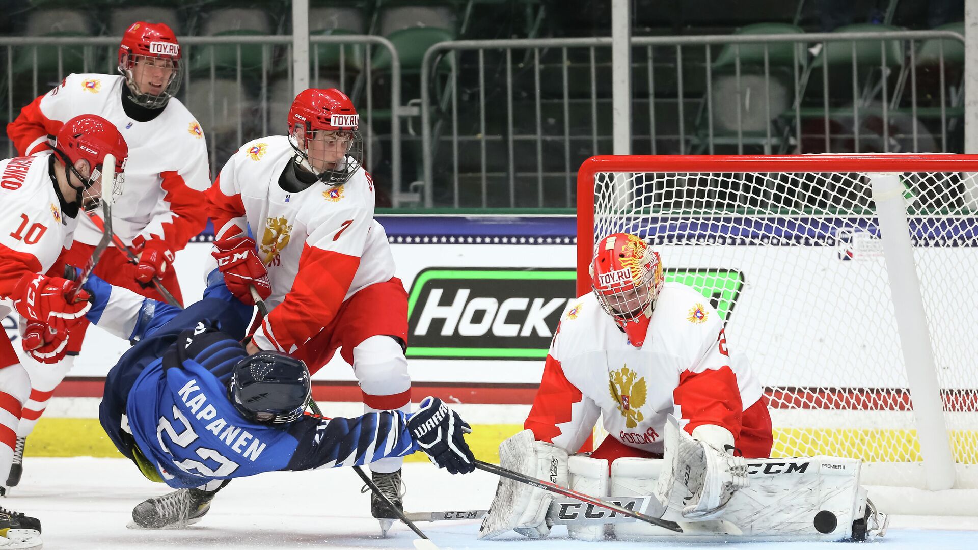 FRISCO, TX USA - APRIL 27: Russia's Sergei Ivanov #29 makes a pad save against Finland's Oliver Kapanen #22 while Arseni Koromyslov #7 defends during preliminary round action at the 2021 IIHF Ice Hockey U18 World Championship at Comerica Center on April 27, 2021 in Frisco, TX USA. (Photo by Chris Tanouye/HHOF-IIHF Images) - РИА Новости, 1920, 28.04.2021