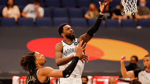 Apr 27, 2021; Tampa, Florida, USA;  Brooklyn Nets forward Jeff Green (8) drives to the basket over Toronto Raptors forward Freddie Gillespie (55) in the first half at Amalie Arena. Mandatory Credit: Nathan Ray Seebeck-USA TODAY Sports