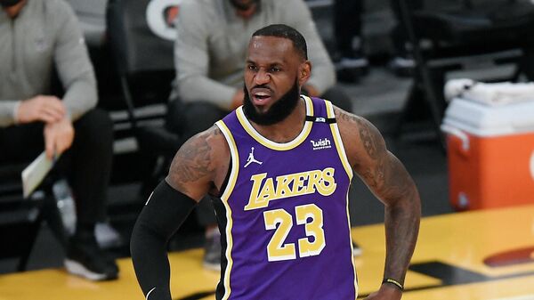 LOS ANGELES, CA - APRIL 30: LeBron James #23 of the Los Angeles Lakers reacts during the first half against the Sacramento Kings at Staples Center on April 30, 2021 in Los Angeles, California. NOTE TO USER: User expressly acknowledges and agrees that, by downloading and or using this photograph, User is consenting to the terms and conditions of the Getty Images License Agreement.   Kevork Djansezian/Getty Images/AFP (Photo by KEVORK DJANSEZIAN / GETTY IMAGES NORTH AMERICA / Getty Images via AFP)