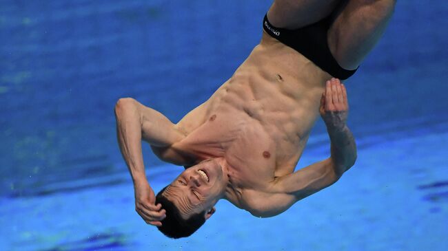 Germany's Patrick Hausding competes in the final of the Men's 1m Springboard Diving event during the LEN European Aquatics Championships at the Duna Arena in Budapest on May 12, 2021. (Photo by Attila KISBENEDEK / AFP)