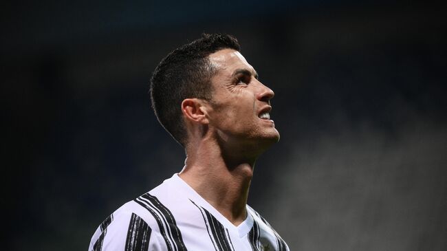 Juventus' Portuguese forward Cristiano Ronaldo reacts during the Italian Serie A football match Sassuolo vs Juventus on May 12, 2021 at the Mapei-Citta del Tricolore stadium in Reggio Emilia. (Photo by Marco BERTORELLO / AFP)