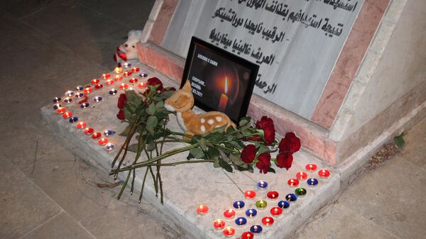 Акция памяти погибшим в казанской школе в Алеппо
