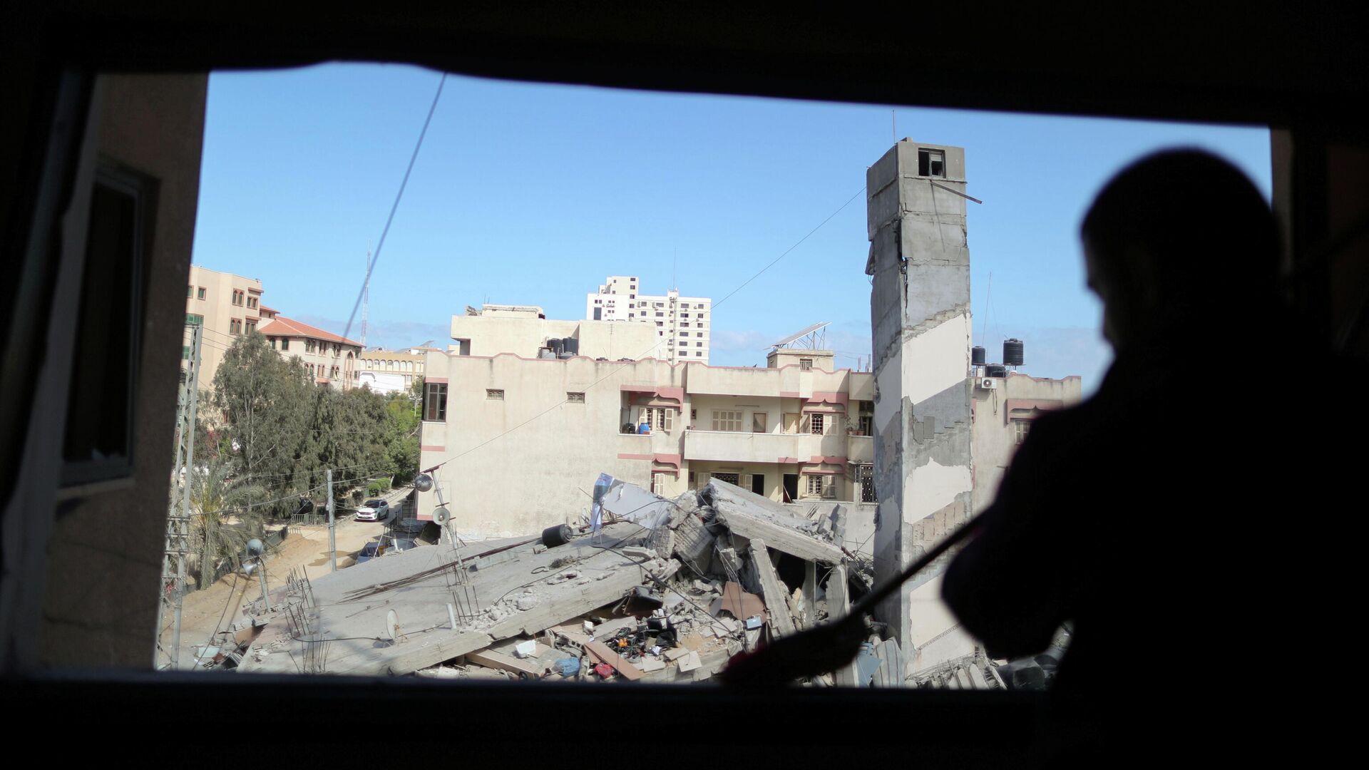 Здание в Газе, разрушенное в результате израильского авиаудара - РИА Новости, 1920, 18.05.2021