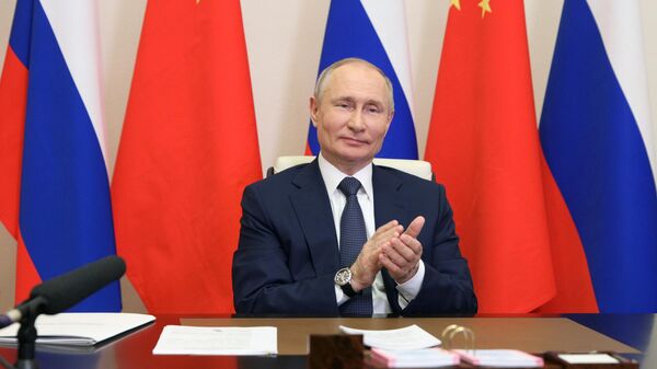 Президент РФ Владимир Путин принимает участие по видеосвязи в церемонии начала строительства энергоблоков №7 и №8 Тяньваньской АЭС и энергоблоков №3 и №4 АЭС Сюйдапу в Китае