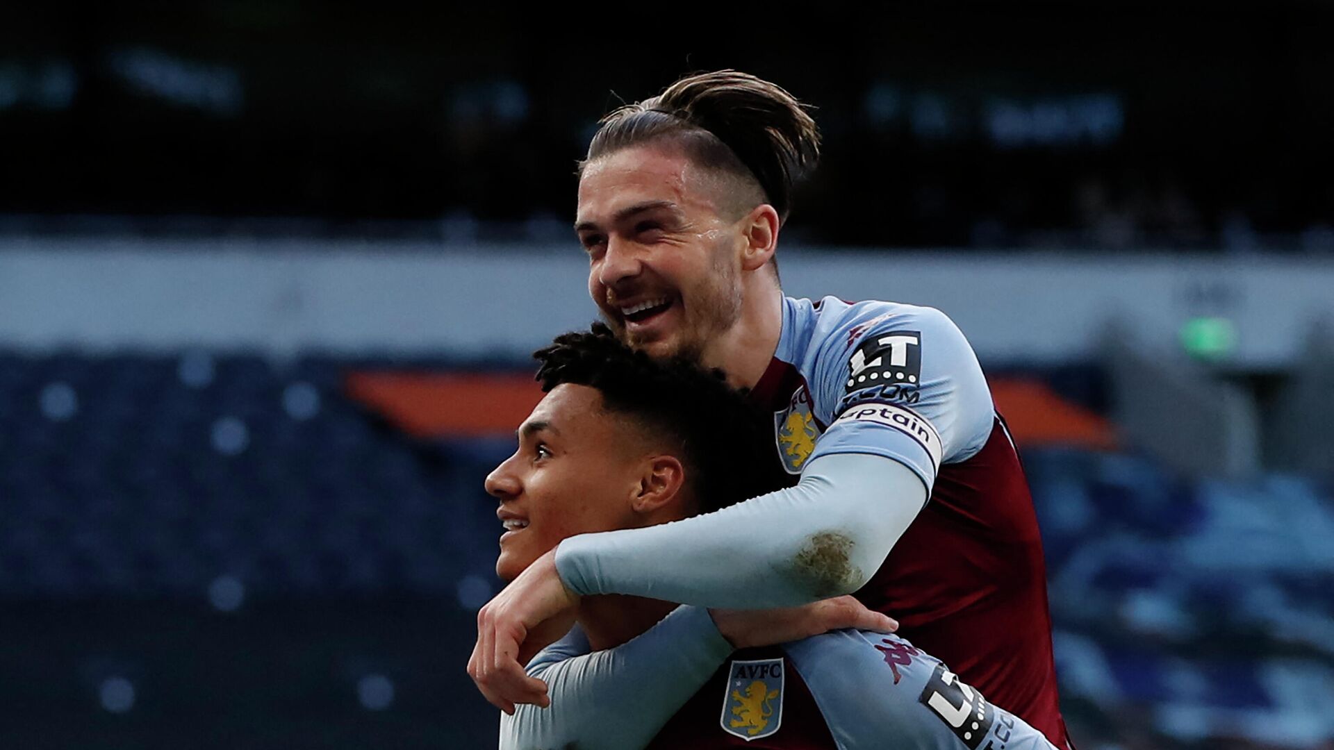 Aston Villa's English striker Ollie Watkins (L) celebrates scoring his team's second goal with Aston Villa's English midfielder Jack Grealish during the English Premier League football match between Tottenham Hotspur and Aston Villa at Tottenham Hotspur Stadium in London, on May 19, 2021. (Photo by PAUL CHILDS / POOL / AFP) / RESTRICTED TO EDITORIAL USE. No use with unauthorized audio, video, data, fixture lists, club/league logos or 'live' services. Online in-match use limited to 120 images. An additional 40 images may be used in extra time. No video emulation. Social media in-match use limited to 120 images. An additional 40 images may be used in extra time. No use in betting publications, games or single club/league/player publications. /  - РИА Новости, 1920, 19.05.2021