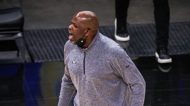 ATLANTA, GA - MAY 10: Nate McMillan, head coach of the Atlanta Hawks, reacts after Hawks win at the end of a game between the Washington Wizards and the Atlanta Hawks at State Farm Arena on May 10, 2021 in Atlanta, Georgia. NOTE TO USER: User expressly acknowledges and agrees that, by downloading and or using this photograph, User is consenting to the terms and conditions of the Getty Images License Agreement.   Casey Sykes/Getty Images/AFP (Photo by Casey Sykes / GETTY IMAGES NORTH AMERICA / Getty Images via AFP)