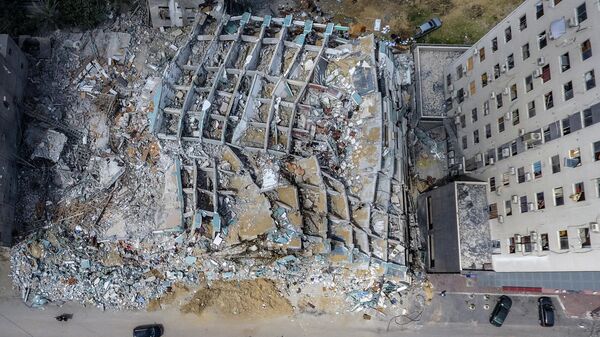 Разрушенная израильским авиаударом башня Аль-Джалаа в Газе