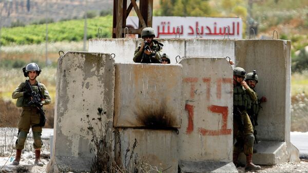 Столкновения между израильской полицией и палестинцами на Западном берегу