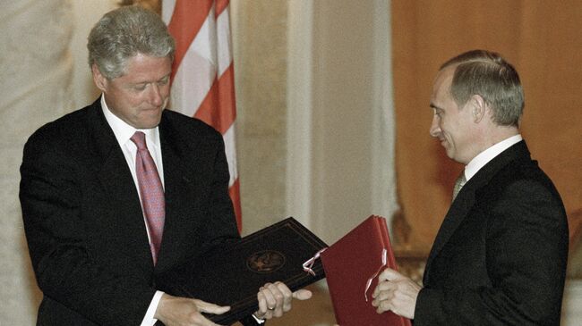Владимир Путин и Билл Клинтон