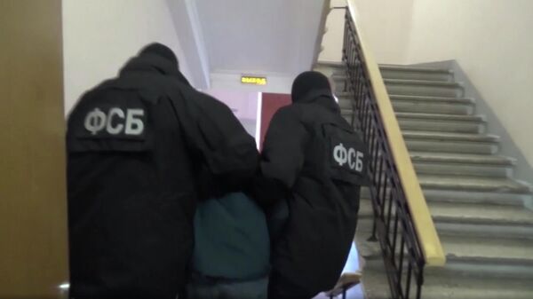 Сотрудники ФСБ во время задержания. Архив