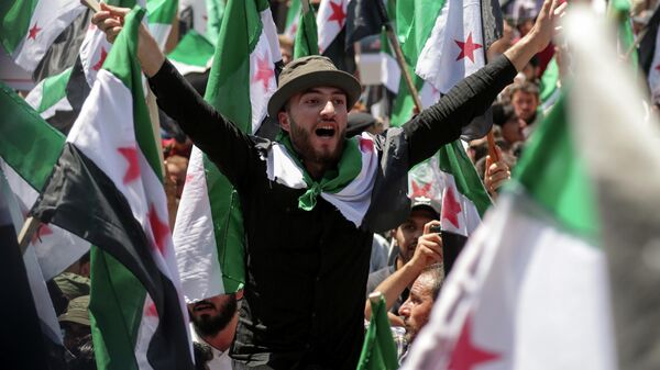 Демонстрация против президента Сирии Башара Асада и президентских выборов в Идлибе, Сирия