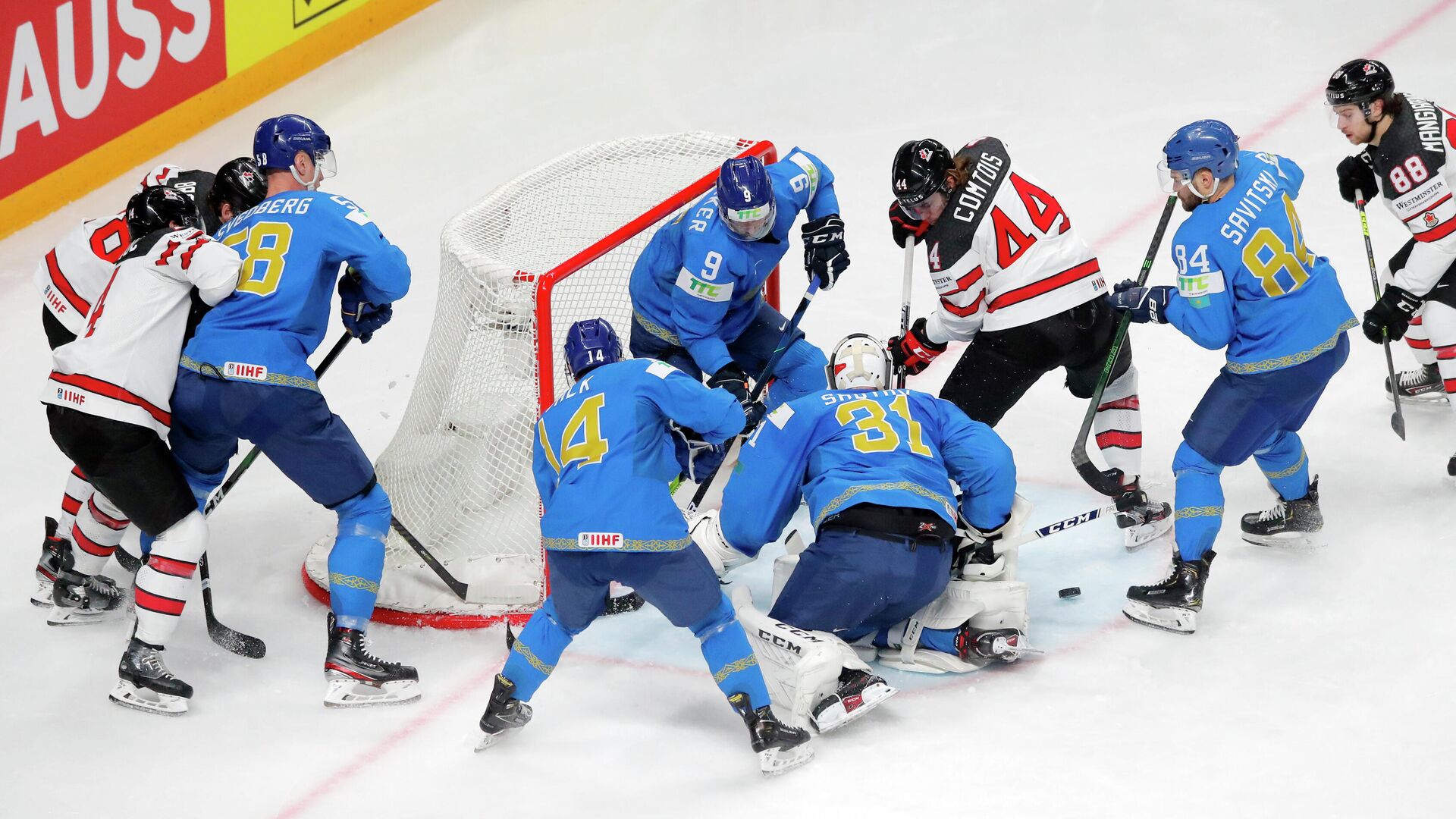 Ice Hockey - IIHF World Ice Hockey Championship 2021 - Group B - Kazakhstan v Canada - Arena Riga, Riga, Latvia - May 28, 2021 Kazakhstan's Andrei Shutov, Jesse Blacker and teammates in action with Canada's Maxime Comtois REUTERS/Vasily Fedosenko - РИА Новости, 1920, 28.05.2021