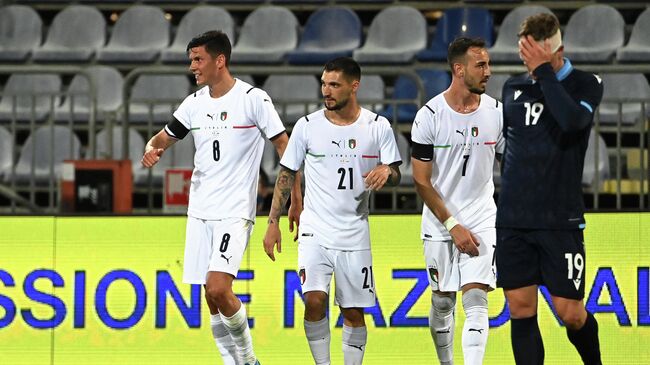 Italy's midfielder Matteo Pessina (L) celebrates with teammates after scoring a goal during a friendly football match between Italy and San Marino at the Sardegna Arena in Cagliari on May 28, 2021, in preparation for the UEFA Euro 2020 European Football Championship. (Photo by ANDREAS SOLARO / AFP)