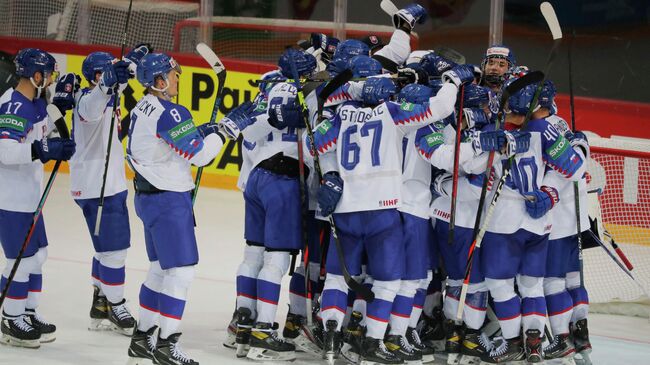 ice Hockey - IIHF World Ice Hockey Championship 2021 - Group A - Slovakia v Denmark - Olympic Sports Centre, Riga, Latvia - May 29, 2021 Slovakia players celebrate after the match REUTERS/Vasily Fedosenko