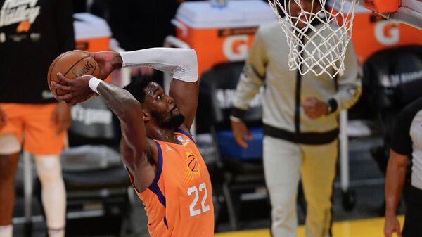 May 30, 2021; Los Angeles, California, USA; Phoenix Suns center Deandre Ayton (22) dunks for a basket against the Los Angeles Lakers during the second half in game four of the first round of the 2021 NBA Playoffs. at Staples Center. Mandatory Credit: Gary A. Vasquez-USA TODAY Sports