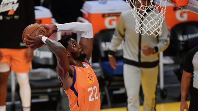 May 30, 2021; Los Angeles, California, USA; Phoenix Suns center Deandre Ayton (22) dunks for a basket against the Los Angeles Lakers during the second half in game four of the first round of the 2021 NBA Playoffs. at Staples Center. Mandatory Credit: Gary A. Vasquez-USA TODAY Sports