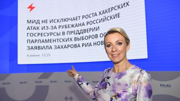 Официальный представитель Министерства иностранных дел России Мария Захарова выпустила новость на сайт ria.ru на стенде МИА Россия сегодня на Петербургском международном экономическом форуме - 2021