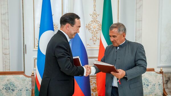  Глава Якутии Айсен Николаев и президент Татарстана Рустам Минниханов 