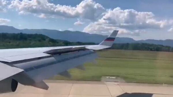 Кадры приземления самолета российской делегации в Женеве