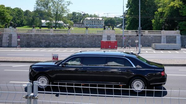 Автомобиль Aurus кортежа президента РФ Владимира Путина в Женеве
