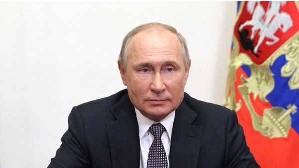 Президент РФ Владимир Путин выступает с видеообращением к участникам и гостям IX Московской конференции по международной безопасности