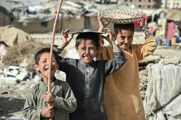 Дети в лагере для внутренне перемещенных лиц в Кабуле, Афганистан