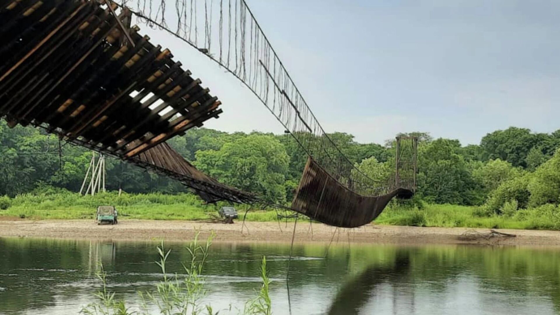 Поврежденный подвесной мост через реку Уссури в Чугуевском муниципальном округе Приморья - РИА Новости, 1920, 28.06.2021