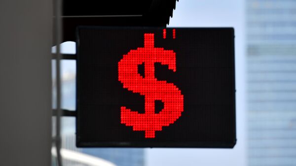Курс доллара по итогам торгов на Мосбирже упал ниже 61 рубля