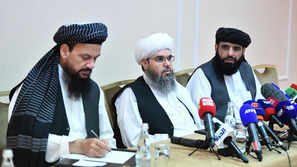 Представители делегации политического офиса движения Талибан* на пресс-конференции в Москве