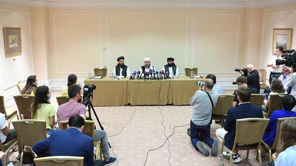Представители делегации политического офиса движения Талибан* на пресс-конференции в Москве