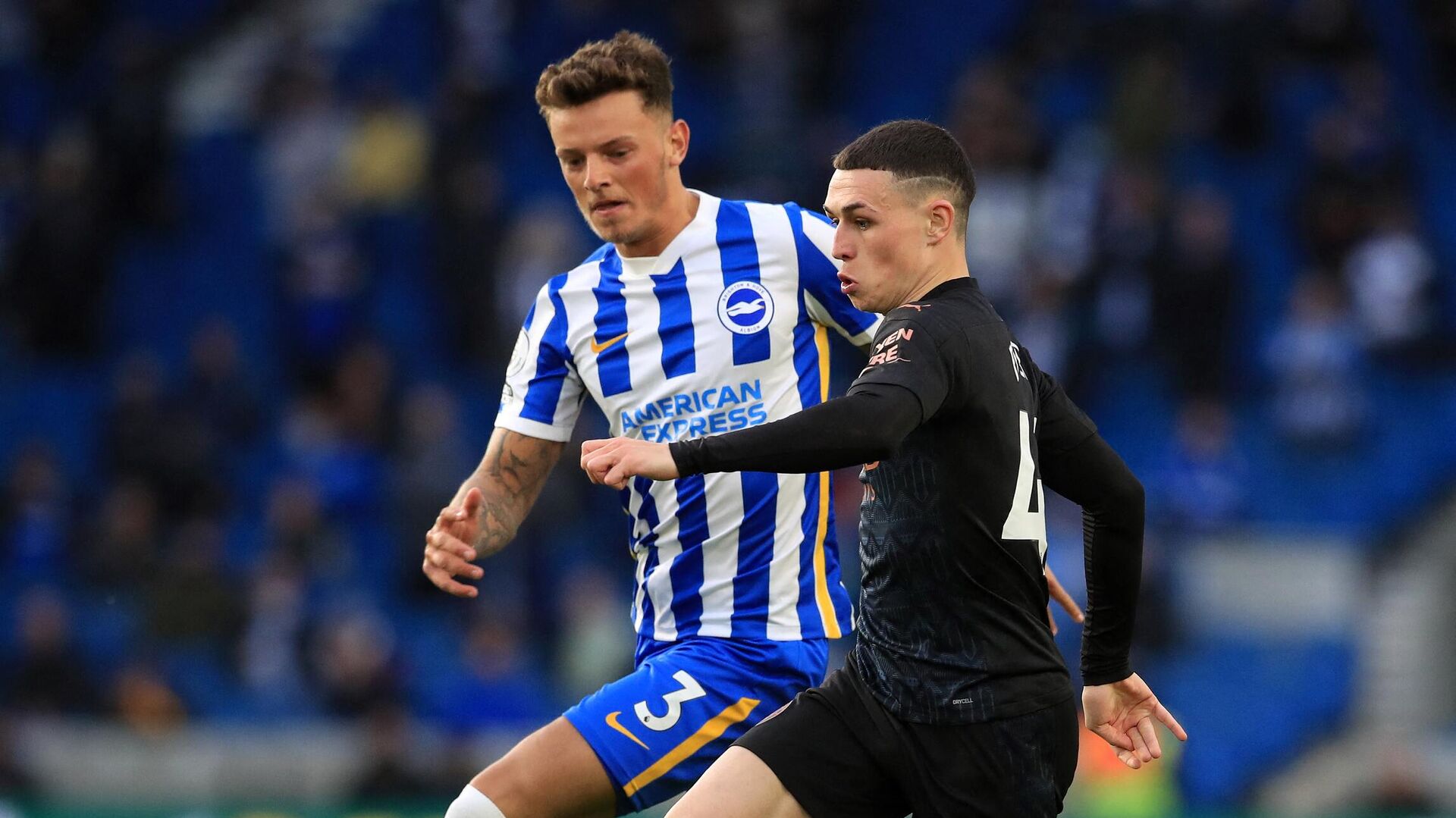 Manchester City's English midfielder Phil Foden runs past Brighton's English defender Ben White to scores his team's second goal during the English Premier League football match between Brighton and Hove Albion and Manchester City at the American Express Community Stadium in Brighton, southern England on May 18, 2021. (Photo by Gareth Fuller / POOL / AFP) / RESTRICTED TO EDITORIAL USE. No use with unauthorized audio, video, data, fixture lists, club/league logos or 'live' services. Online in-match use limited to 120 images. An additional 40 images may be used in extra time. No video emulation. Social media in-match use limited to 120 images. An additional 40 images may be used in extra time. No use in betting publications, games or single club/league/player publications. /  - РИА Новости, 1920, 17.07.2021